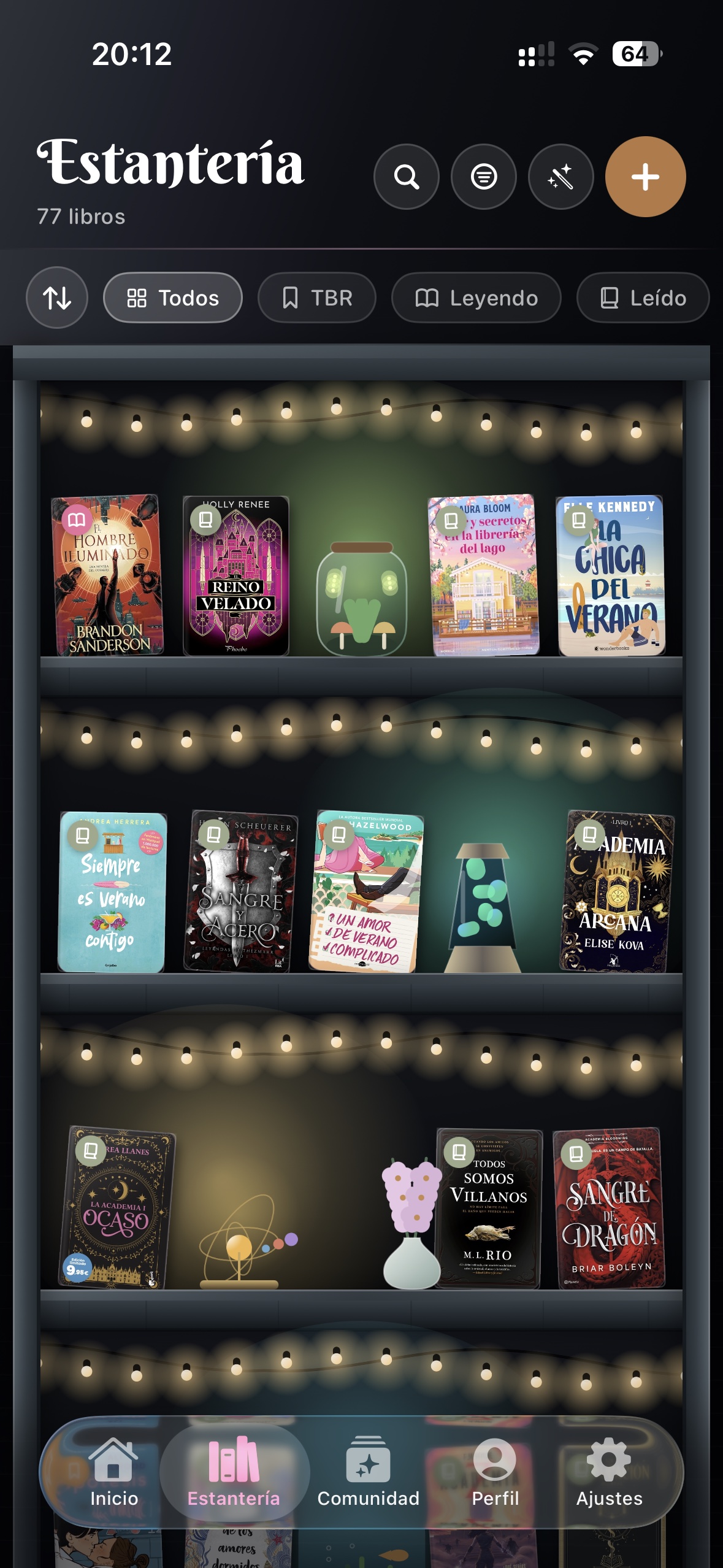 Customized Mistbook bookshelf with covers, lights, and decorative objects